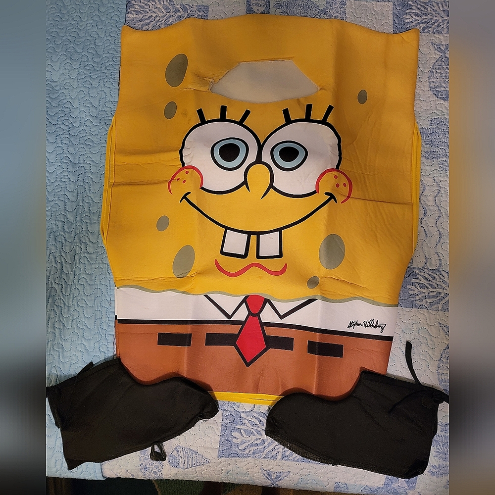 Spongebob SquarePants Halloween costume. Boys size 10/12. Tunic & shoe covers.